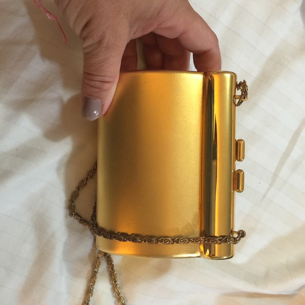 Gold tone purse with chain